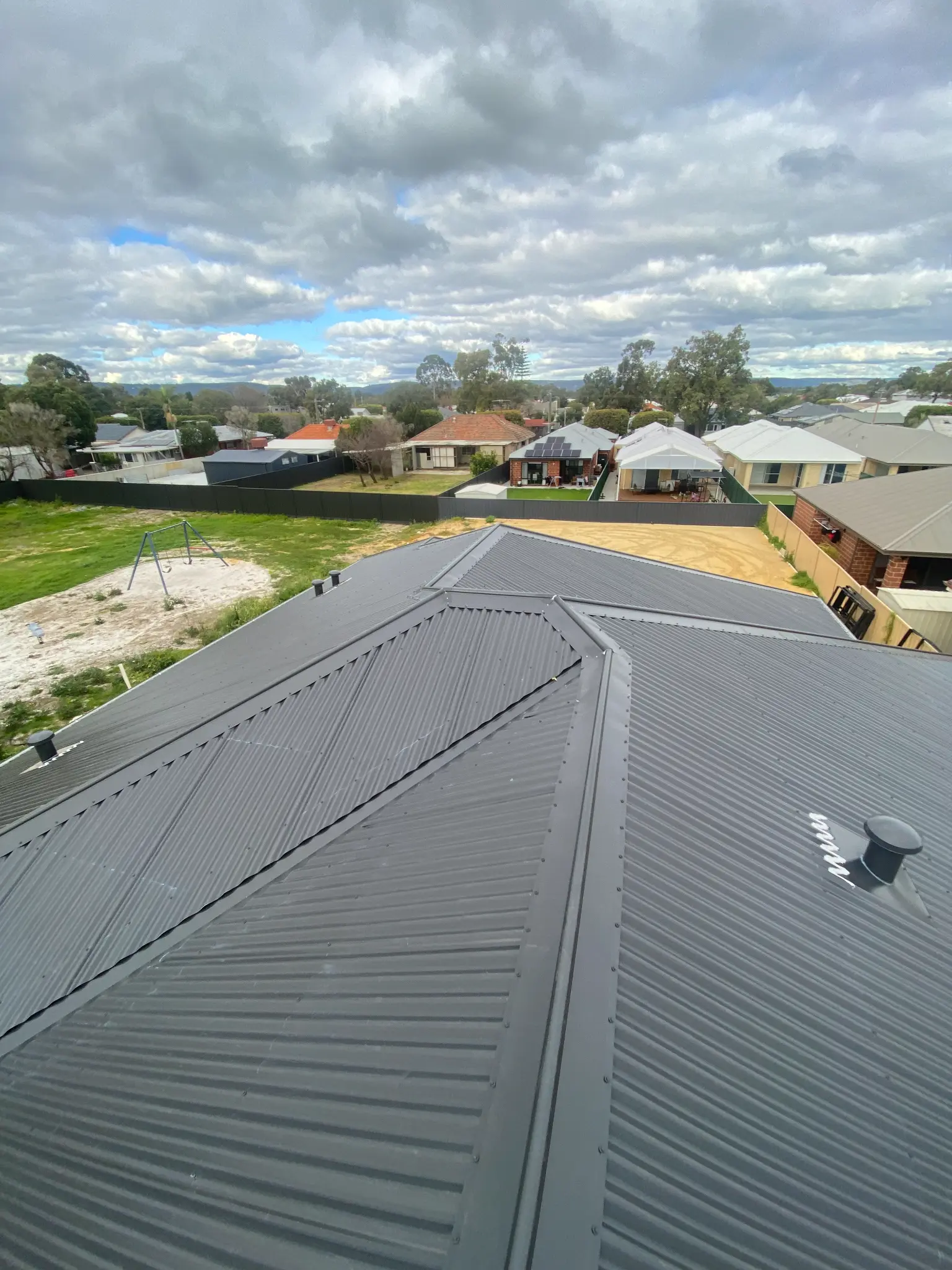 Charcoal metal roof replacement