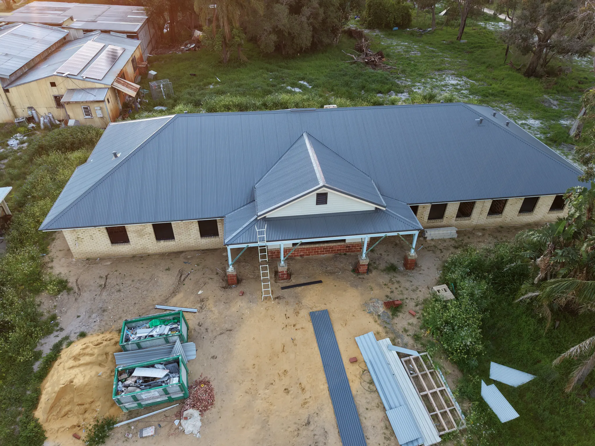 Aerial view of a complete metal roof installation