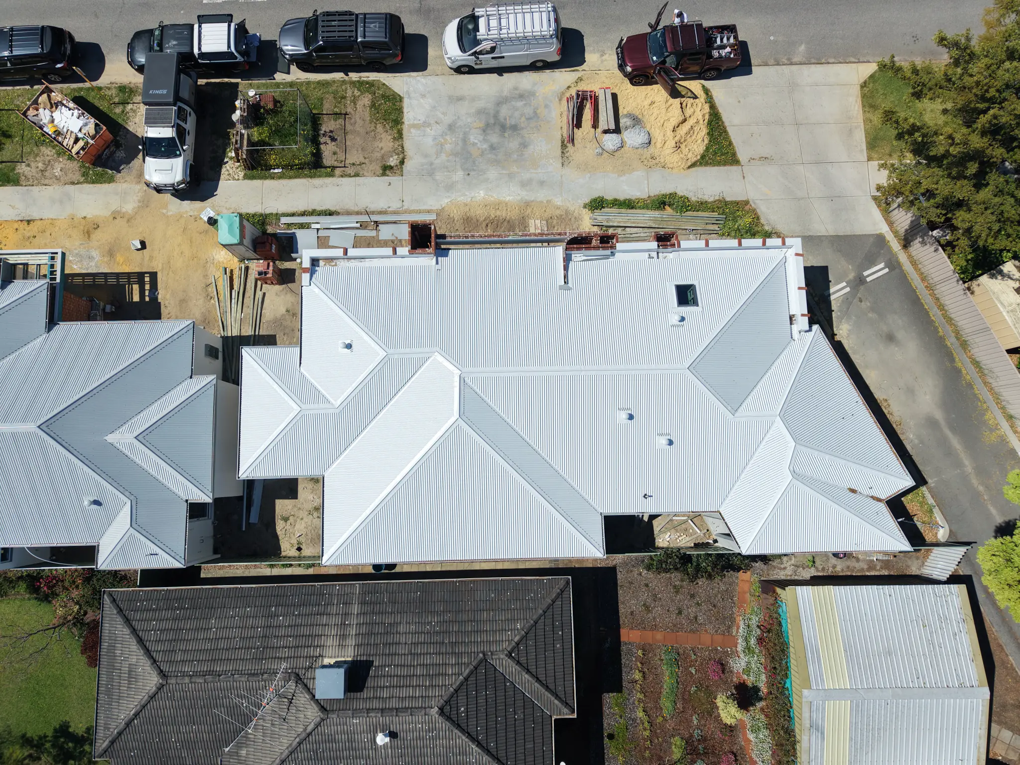 Top-down view of complex metal roof geometry