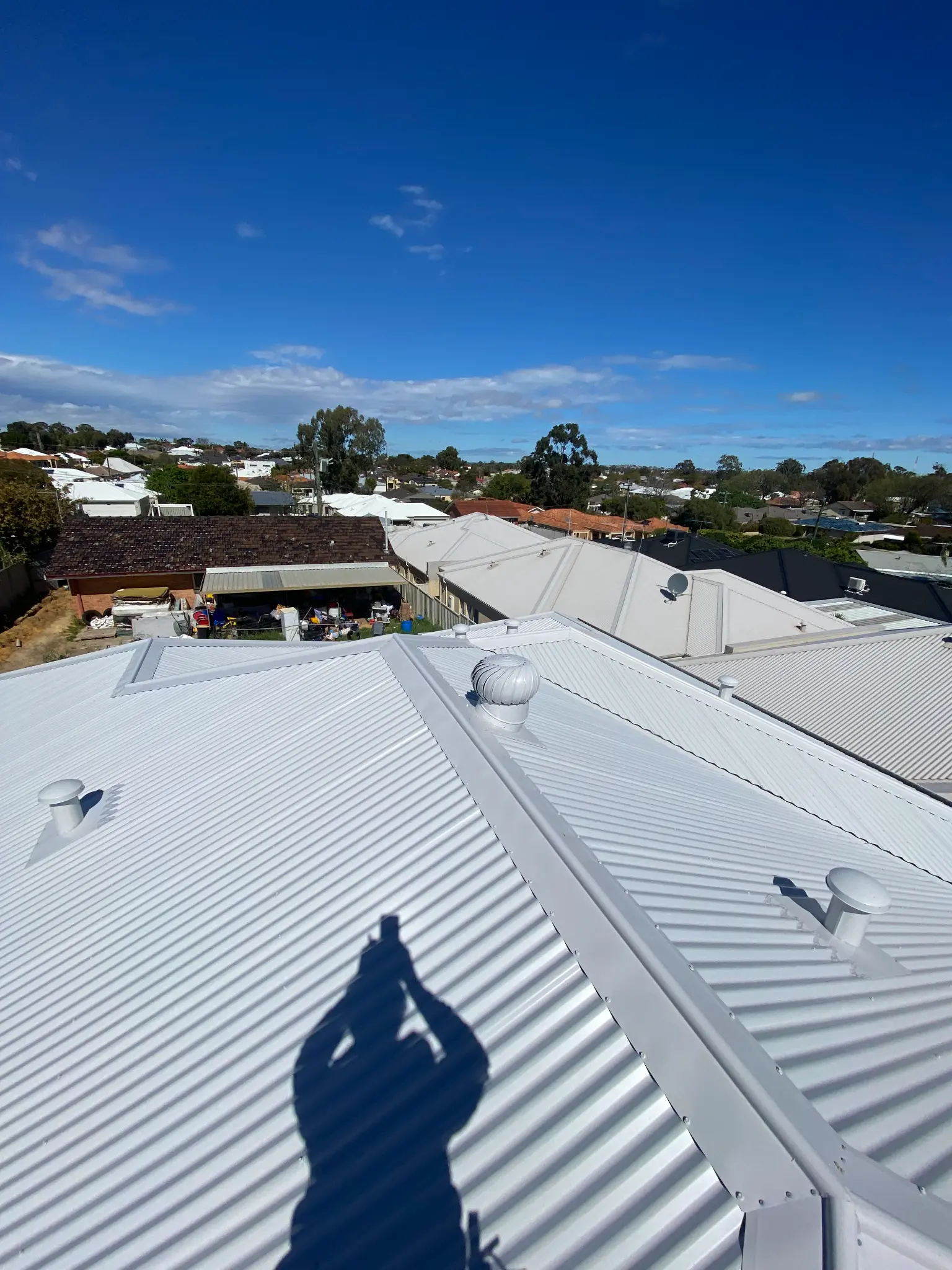 Bright metal re-roof with a durable finish