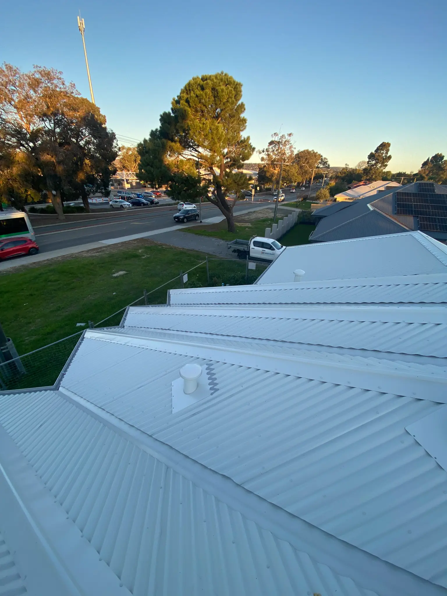 White metal roof system with coordinated details